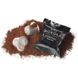 Morola Corposo capsule on coffee powder